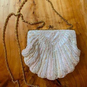 Beautiful vintage beaded purse with long chain strap and seashell shape
